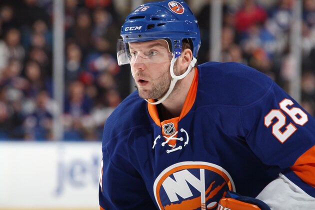UNIONDALE, NY - FEBRUARY 27: Thomas Vanek #26 of the New York Islanders skates against the New York Islanders at the Nassau Veterans Memorial Coliseum on February 27, 2014 in Uniondale, New York. The Islanders defeated the Maple Leafs 5-4 in overtime.  (Photo by Bruce Bennett/Getty Images)