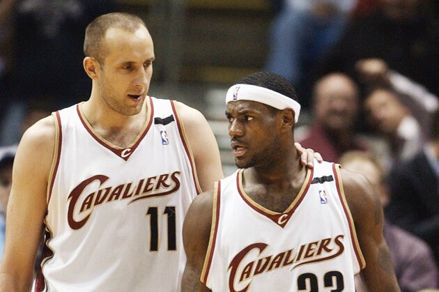 ** FILE ** Cleveland Cavaliers' Zydrunas Ilgauskas, left, and LeBron James walk back on the court in a game against the New Jersey Nets, Nov. 10, 2004, in Cleveland. The big center from Lithuania believes the Cavaliers are good enough to make a deep run in the NBA playoffs this season,  but with the Feb. 24 trade deadline approaching, he may not be around to see it happen. (AP Photo/Tony Dejak, File)
