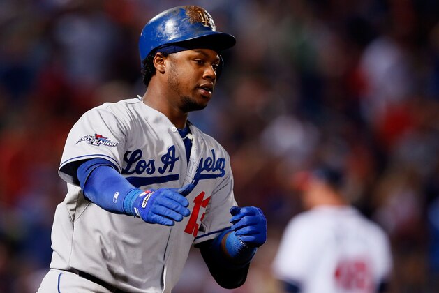 ATLANTA, GA - OCTOBER 04: Hanley Ramirez #13 of the Los Angeles Dodgers runs the bases after hitting a two-run home run in the eighth inning against the Atlanta Braves during Game Two of the National League Division Series at Turner Field on October 4, 2013 in Atlanta, Georgia.  (Photo by Kevin C. Cox/Getty Images)