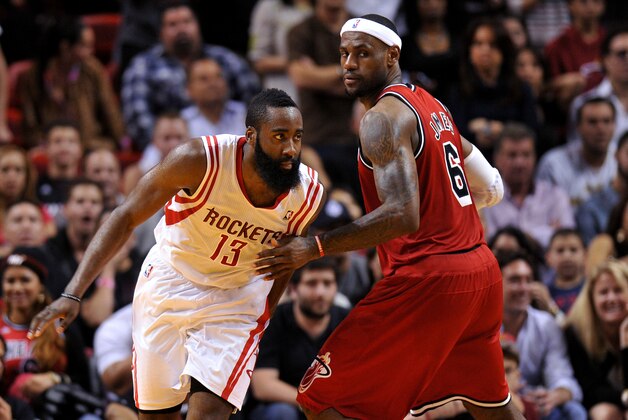 Feb 6 2013; Miami, FL, USA; Houston Rockets shooting guard James Harden (13) and Miami Heat small forward LeBron James (6) during the second half at American Airlines Arena. The Heat won 114-108. Mandatory Credit: Steve Mitchell-USA TODAY Sports