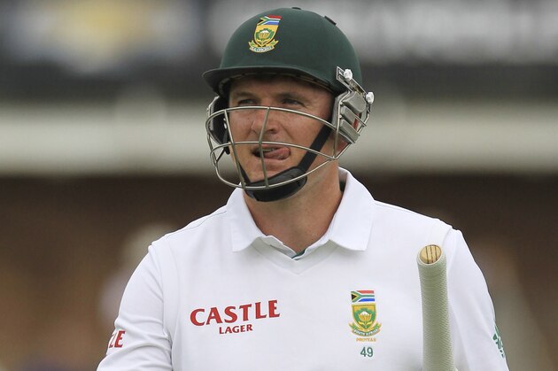 South Africa's captain Graeme Smith walks back to the players pavilion after dismissed by Australia's bowler Ryan Harris, for 9 runs on the first day of their 2nd cricket test match at St George's Park in Port Elizabeth, South Africa, Thursday, Feb. 20, 2014. (AP Photo/ Themba Hadebe)