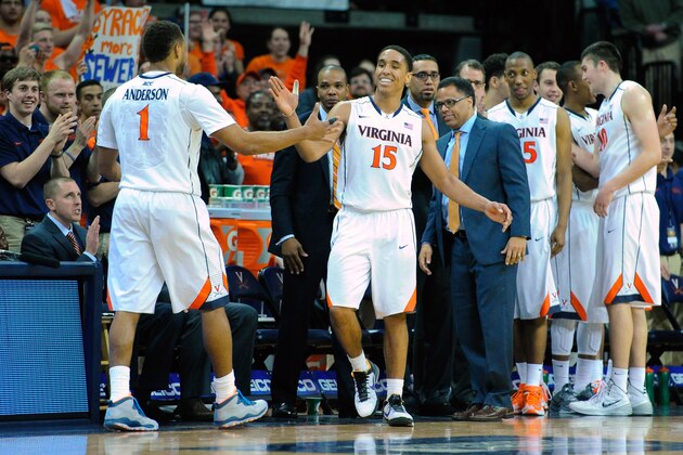 CHARLOTTESVILLE, VA - MARCH 01:  Justin Anderson #1 and Malcolm Brogdon #15 of the Virginia Cavaliers celebrate against the Syracuse Orange during the second half at John Paul Jones Arena on March 1, 2014 in Charlottesville, Virginia.  Virginia defeated Syracuse 75-56.  (Photo by Rich Barnes/Getty Images)