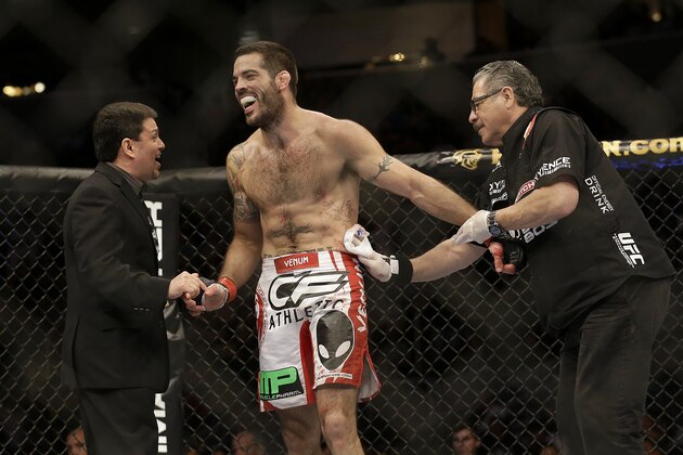 Matt Brown celebrates after beating Jordan Mein in a UFC welterweight mixed martial arts fight in San Jose, Calif., Saturday, April 20, 2013. Brown won by technical knock out in the second round. (AP Photo/Jeff Chiu)