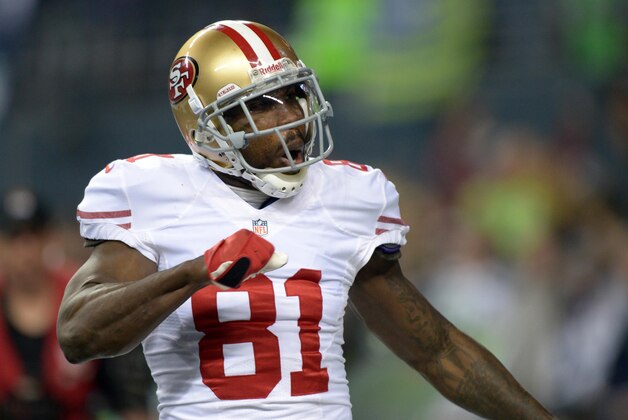 Jan 19, 2014; Seattle, WA, USA; San Francisco 49ers wide receiver Anquan Boldin (81) celebrates after catching a touchdown pass against the Seattle Seahawks in the third quarter of the 2013 NFC Championship football game at CenturyLink Field. Mandatory Credit: Kirby Lee-USA TODAY Sports