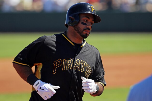 Pittsburgh Pirates' Pedro Alvarez, rounds third base after hitting a two-run home run off Red Sox pitcher Brandon Workman during the first inning of an exhibition spring training baseball game in Bradenton, Fla., Monday, March 3, 2014. The Pirates won 7-6. (AP Photo/Gene J. Puskar)