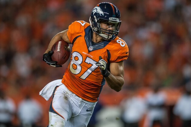 DENVER, CO - SEPTEMBER 5:  Wide receiver Eric Decker #87 of the Denver Broncos runs for yards after the catch against the Baltimore Ravensduring the game at Sports Authority Field at Mile High on September 5, 2013 in Denver Colorado. (Photo by Dustin Bradford/Getty Images)