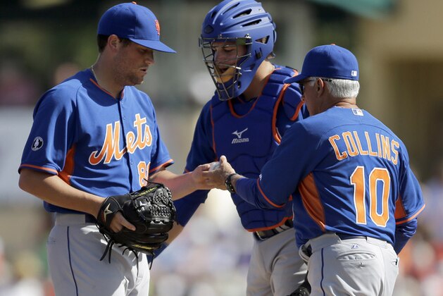 New York Mets pitcher Jack Leathersich, left, is removed by manager Terry Collins, right, as catcher Kevin Plawecki watches during the sixth inning of a spting exhibition baseball game against the St. Louis Cardinals, Sunday, March 2, 2014, in Jupiter, Fla. (AP Photo/Jeff Roberson)