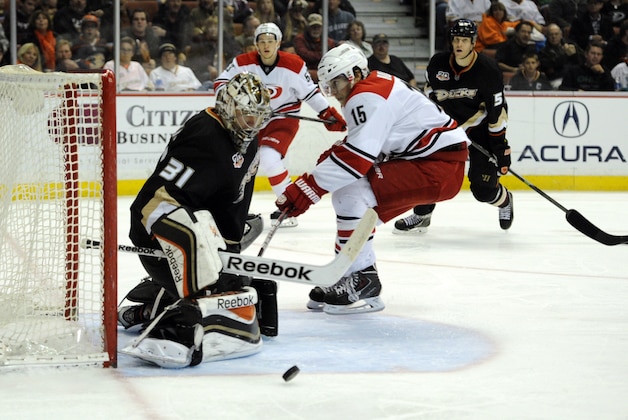 Mar 2, 2014; Anaheim, CA, USA; Anaheim Ducks goalie Frederik Andersen (31) blocks a shot by Carolina Hurricanes right wing Tuomo Ruutu (15) during the second period at Honda Center. Mandatory Credit: Kelvin Kuo-USA TODAY Sports