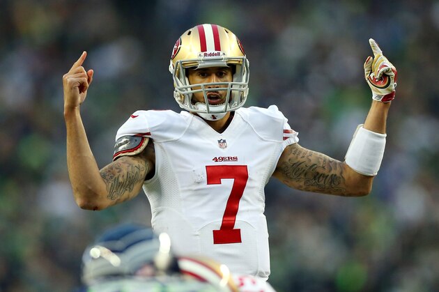 SEATTLE, WA - JANUARY 19: Quarterback Colin Kaepernick #7 of the San Francisco 49ers calls a play against the Seattle Seahawks during the 2014 NFC Championship at CenturyLink Field on January 19, 2014 in Seattle, Washington. (Photo by Ronald Martinez/Getty Images) SEATTLE, WA - JANUARY 19: Quarterback Colin Kaepernick #7 of the San Francisco 49ers calls a play against the Seattle Seahawks during the 2014 NFC Championship at CenturyLink Field on January 19, 2014 in Seattle, Washington. (Photo by Ronald Martinez/Getty Images)