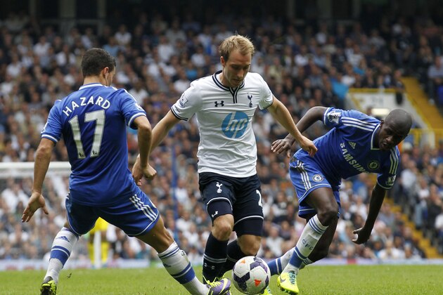 Tottenham Hotspur's Christian Eriksen, center, competes with Chelsea's Eden Hazard, left, and Ramires during their English Premier League soccer match at White Hart Lane, London, Saturday, Sept. 28, 2013. (AP Photo/Sang Tan)