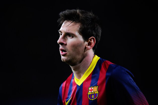 BARCELONA, SPAIN - FEBRUARY 15:  Lionel Messi of FC Barcelona looks on during the La Liga match between FC Barcelona and Rayo Vallecano de Madrid at Camp Nou on February 15, 2014 in Barcelona, Spain.  (Photo by David Ramos/Getty Images)
