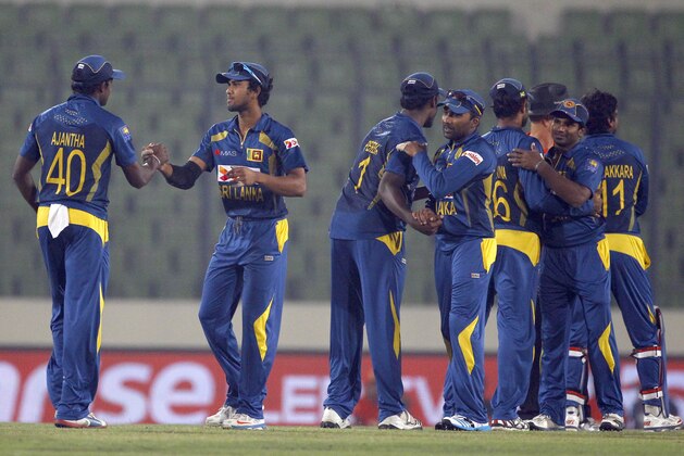 Sri Lankan players celebrate their win over Afghanistan during the Asia Cup one-day international cricket match in Dhaka, Bangladesh, Monday, March 3, 2014. Sri Lanka won the match by 129 runs. (AP Photo/A.M. Ahad) Sri Lankan players celebrate their win over Afghanistan during the Asia Cup one-day international cricket match in Dhaka, Bangladesh, Monday, March 3, 2014. Sri Lanka won the match by 129 runs. (AP Photo/A.M. Ahad)