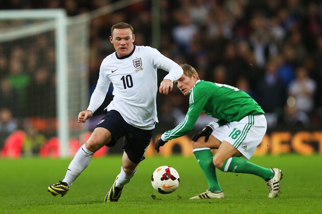 LONDON, ENGLAND - NOVEMBER 19: Wayne Rooney of England evades Toni Kroos of Germany during the international friendly match between England and Germany at Wembley Stadium on November 19, 2013 in London, England. (Photo by Clive Rose/Getty Images) LONDON, ENGLAND - NOVEMBER 19: Wayne Rooney of England evades Toni Kroos of Germany during the international friendly match between England and Germany at Wembley Stadium on November 19, 2013 in London, England. (Photo by Clive Rose/Getty Images)