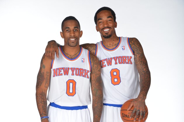 NEW YORK, NY - SEPTEMBER 30: Chris Smith #0 and J.R. Smith #8 of the New York Knicks pose for a portrait at Media Day on September 30, 2013 at Madison Square Garden in New York City, New York. NOTE TO USER: User expressly acknowledges and agrees that, by downloading and or using this photograph, User is consenting to the terms and conditions of the Getty Images License Agreement. Mandatory Copyright Notice: Copyright 2013 NBAE (Photo by Jesse D. Garrabrant/NBAE via Getty Images)