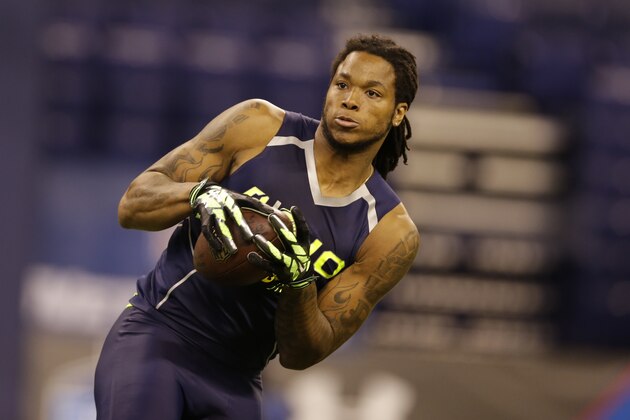 Florida State wide receiver Kelvin Benjamin makes a catch during a drill at the NFL football scouting combine in Indianapolis, Sunday, Feb. 23, 2014. (AP Photo/Michael Conroy)