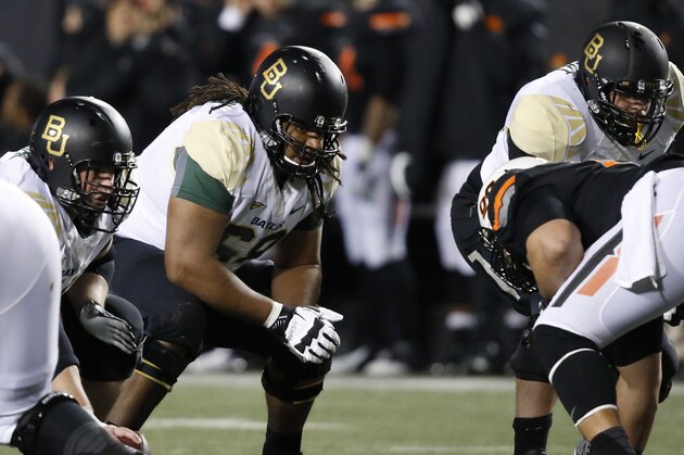 Baylor's Cyril Richardson (68) is pictured in the third quarter of an NCAA college football game against Oklahoma State in Stillwater, Okla., Saturday, Nov. 23, 2013. Oklahoma State won 49-17. (AP Photo/Sue Ogrocki)