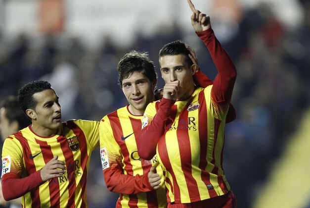 Barcelona's Cristian Tello, right, celebrates after scoring against Levante during their la Copa del Rey soccer match at the Ciutat de Valencia stadium in Valencia, Spain, Wednesday, Jan. 22, 2014. (AP Photo/Alberto Saiz) Barcelona's Cristian Tello, right, celebrates after scoring against Levante during their la Copa del Rey soccer match at the Ciutat de Valencia stadium in Valencia, Spain, Wednesday, Jan. 22, 2014. (AP Photo/Alberto Saiz)