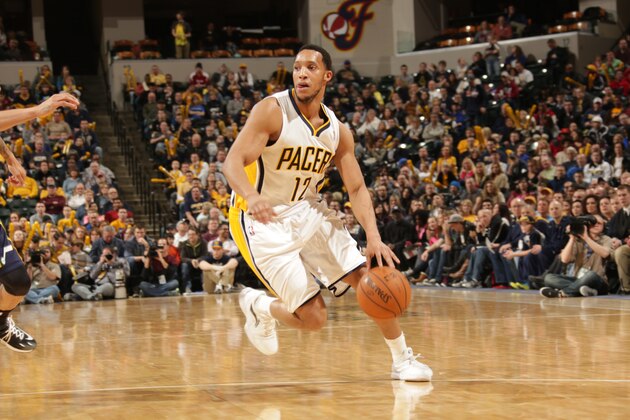 INDIANAPOLIS - MARCH 2: Evan Turner #12 of the Indiana Pacers drives against the Utah Jazz at Bankers Life Fieldhouse on March 2, 2014 in Indianapolis, Indiana.  NOTE TO USER: User expressly acknowledges and agrees that, by downloading and or using this Photograph, user is consenting to the terms and condition of the Getty Images License Agreement. Mandatory Copyright Notice: 2014 NBAE  (Photo by Ron Hoskins/NBAE via Getty Images)