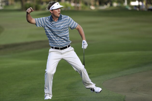 Russell Henley celebrates as he tied for the lead by chipping in for birdie on the 14th hole during the final round of the Honda Classic golf tournament, Sunday, March 2, 2014, in Palm Beach Gardens, Fla. Henley won the tournament after a four-man playoff. (AP Photo/Wilfredo Lee)