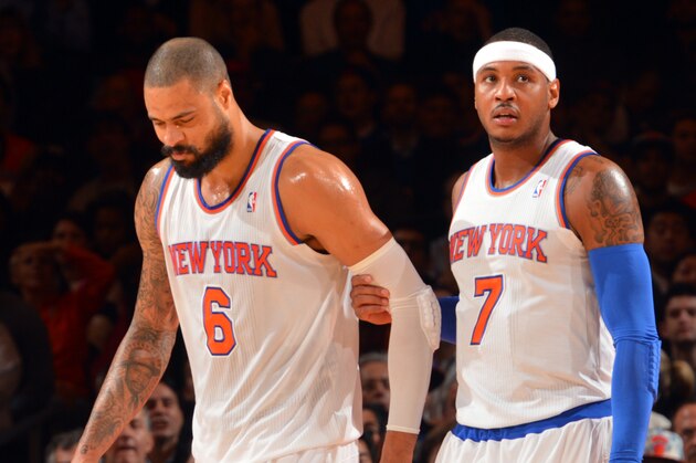 NEW YORK, NY - NOVEMBER 5: (L-R) Tyson Chandler #6 and Carmelo Anthony #7 of the New York Knicks walk on the court against the Charlotte Bobcats during the game on November 5, 2013 at Madison Square Garden in New York City, New York. NOTE TO USER: User expressly acknowledges and agrees that, by downloading and or using this photograph, User is consenting to the terms and conditions of the Getty Images License Agreement. Mandatory Copyright Notice: Copyright 2013 NBAE (Photo by Jesse D. Garrabrant/NBAE via Getty Images)