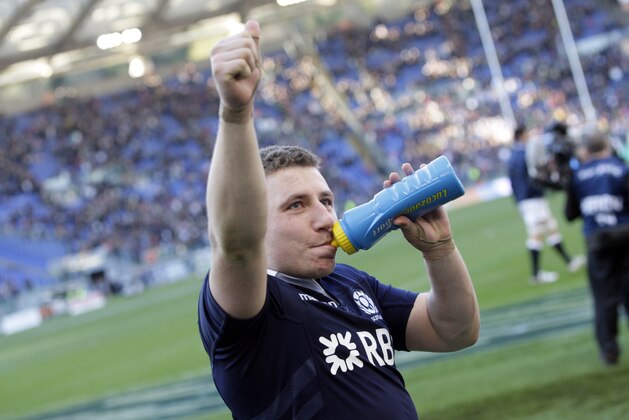 Scotland's Duncan Weir greets supporters at the end of a Six Nations rugby union international match between Italy and Scotland, in Rome, Saturday, Feb. 22, 2014. Scotland won 21-20. (AP Photo/Andrew Medichini)