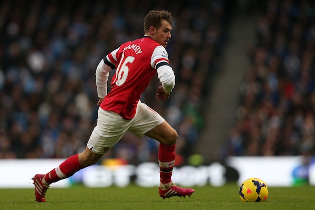 MANCHESTER, ENGLAND - DECEMBER 14:  Aaron Ramsey of Arsenal in action during the Barclays Premier League match between Manchester City and Arsenal at Etihad Stadium  on December 14, 2013 in Manchester, England.  (Photo by Clive Brunskill/Getty Images)