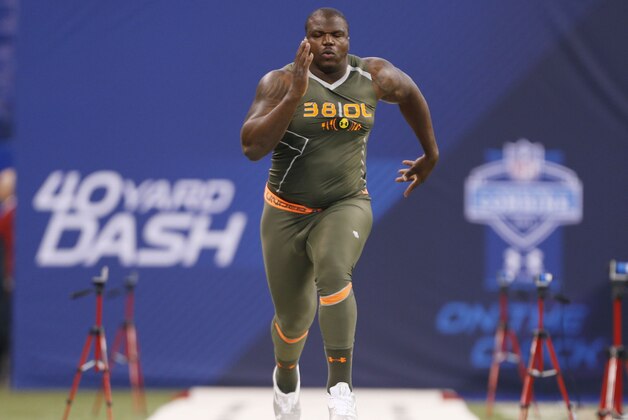 Feb 22, 2014; Indianapolis, IN, USA; Auburn Tigers offensive lineman Greg Robinson runs the 40 yard dash during the 2014 NFL Combine at Lucas Oil Stadium. Mandatory Credit: Brian Spurlock-USA TODAY Sports