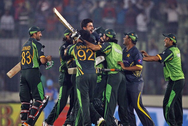 Pakistan’s team celebrates after winning the Asia Cup one-day international cricket tournament against India in Dhaka, Bangladesh, Sunday, March 2, 2014. Pakistan won by 1 wicket. (AP Photo/A.M. Ahad)