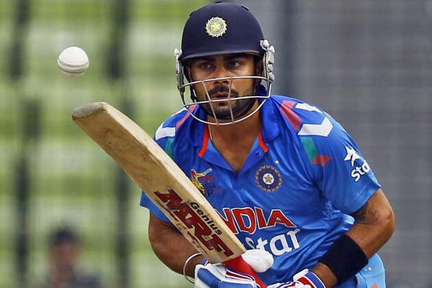India’s Virat Kohli plays a shot during the Asia Cup one-day international cricket tournament against Pakistan in Dhaka, Bangladesh, Sunday, March 2, 2014. (AP Photo/A.M. Ahad)