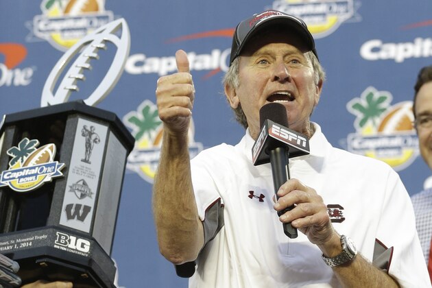 South Carolina head coach Steve Spurrier thanks fans for their support after winning 34-24 in the Capital One Bowl NCAA college football game against Wisconsin in Orlando, Fla., Wednesday, Jan. 1, 2014. (AP Photo/John Raoux)