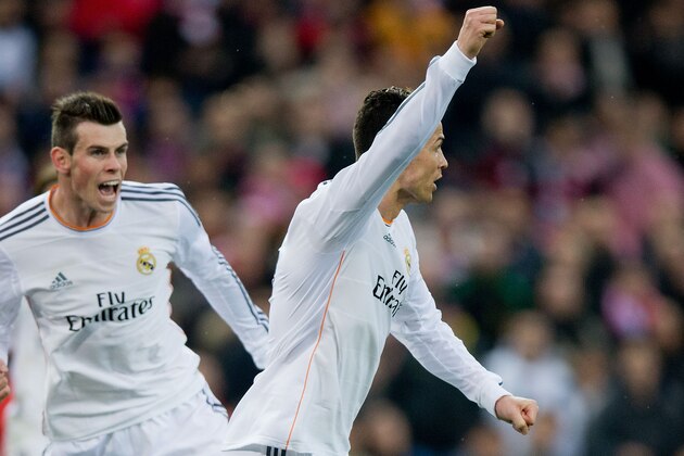 MADRID, SPAIN - MARCH 02: Cristiano Ronaldo (R) of Real Madrid CF celebrates scoring their second goal with teammate Gareth Bale (L) during the La Liga match between Club Atletico de Madrid and Real Madrid CF at Vicente Calderon Stadium on March 2, 2014 in Madrid, Spain. (Photo by Gonzalo Arroyo Moreno/Getty Images) MADRID, SPAIN - MARCH 02: Cristiano Ronaldo (R) of Real Madrid CF celebrates scoring their second goal with teammate Gareth Bale (L) during the La Liga match between Club Atletico de Madrid and Real Madrid CF at Vicente Calderon Stadium on March 2, 2014 in Madrid, Spain. (Photo by Gonzalo Arroyo Moreno/Getty Images)