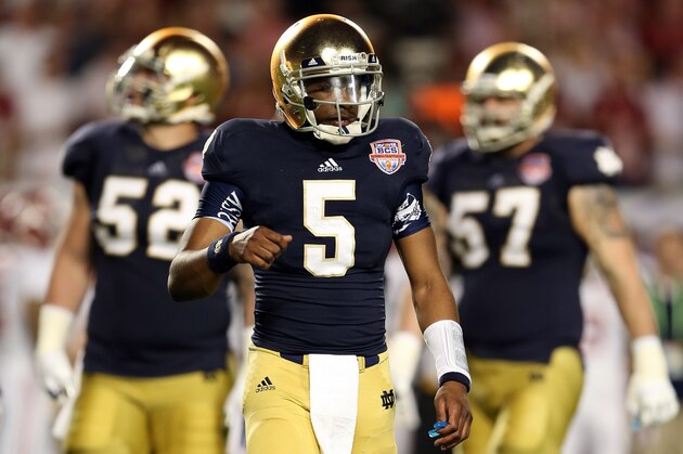 MIAMI GARDENS, FL - JANUARY 07:  Everett Golson #5 of the Notre Dame Fighting Irish looks on after failing to convert on third down against the Alabama Crimson Tide during the 2013 Discover BCS National Championship game at Sun Life Stadium on January 7, 2013 in Miami Gardens, Florida.  (Photo by Streeter Lecka/Getty Images)