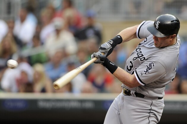 MINNEAPOLIS, MN - AUGUST 15: Adam Dunn #32 of the Chicago White Sox hits an RBI single against the Minnesota Twins during the first inning of the game on August 15, 2013 at Target Field in Minneapolis, Minnesota. (Photo by Hannah Foslien/Getty Images)