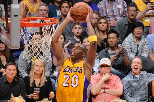 LOS ANGELES, CA - JANUARY 28: Jodie Meeks #20 of the Los Angeles Lakers dunks during a game against the Indiana Pacers at STAPLES Center on January 28, 2014 in Los Angeles, California. NOTE TO USER: User expressly acknowledges and agrees that, by downloading and/or using this Photograph, user is consenting to the terms and conditions of the Getty Images License Agreement. Mandatory Copyright Notice: Copyright 2014 NBAE (Photo by Noah Graham/NBAE via Getty Images)