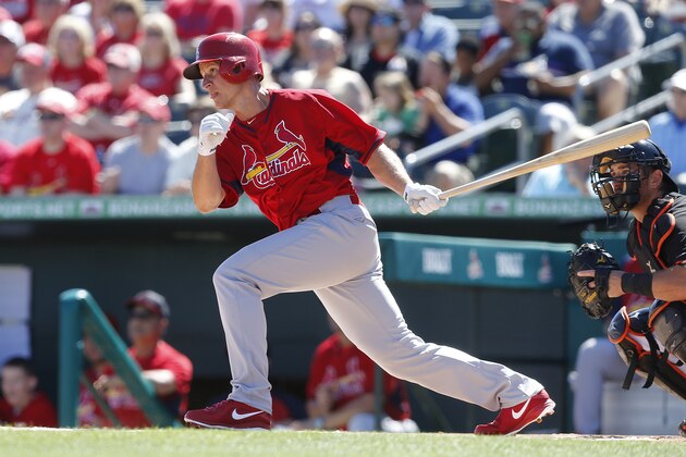 JUPITER, FL - MARCH 1: Mark Ellis #3 of the St Louis Cardinals hits the ball against the Miami Marlins during a spring training game at Roger Dean Stadium on March 1, 2014 in Jupiter, Florida. (Photo by Joel Auerbach/Getty Images)