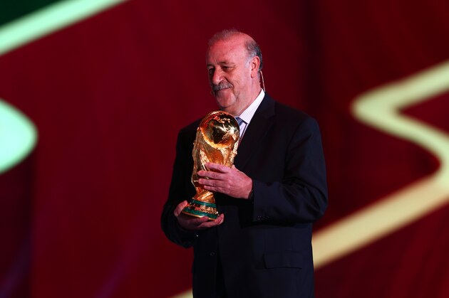 COSTA DO SAUIPE, BRAZIL - DECEMBER 06:  Spain coach Vicente del Bosque holds the World Cup trophy  on stage before the Final Draw for the 2014 FIFA World Cup Brazil at Costa do Sauipe Resort on December 6, 2013 in Costa do Sauipe, Bahia, Brazil.  (Photo by Clive Mason/Getty Images)