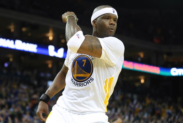 Feb 22, 2014; Oakland, CA, USA; Golden State Warriors center Jermaine O'Neal (7) reacts after a dunk against the Brooklyn Nets during the fourth quarter at Oracle Arena. The Golden State Warriors defeated the Brooklyn Nets 93-86. Mandatory Credit: Kelley L Cox-USA TODAY Sports