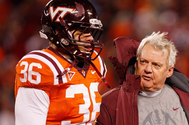 BLACKSBURG, VIRGINIA - NOVEMBER 17:  Head coach Frank Beamer (C) of the Virginia Tech Hokies yells at linebacker Chase Williams #36 of the Hokies after a penalty against the North Carolina Tar Heels at Lane Stadium on November 17, 2011 in Blacksburg, Virginia. (Photo by Geoff Burke/Getty Images)
