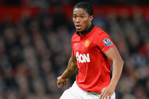 MANCHESTER, ENGLAND - JANUARY 11:  Luis Antonio Valencia of Manchester United in action during the Barclays Premier League match between Manchester United and Swansea City at Old Trafford on January 11, 2014 in Manchester, England.  (Photo by Shaun Botterill/Getty Images)