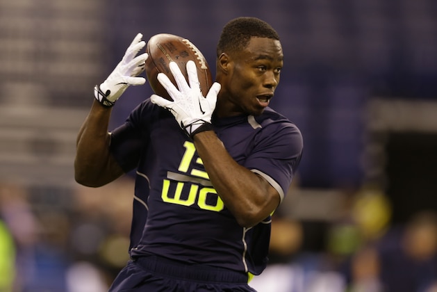 Oregon State wide receiver Brandin Cooks makes a catch during a drill at the NFL football scouting combine in Indianapolis, Sunday, Feb. 23, 2014. (AP Photo/Michael Conroy)
