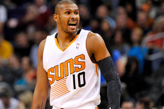 Feb 8, 2014; Phoenix, AZ, USA; Phoenix Suns guard Leandro Barbosa (10) reacts during the second quarter against the Golden State Warriors at US Airways Center. The Suns won 122-109. Mandatory Credit: Casey Sapio-USA TODAY Sports