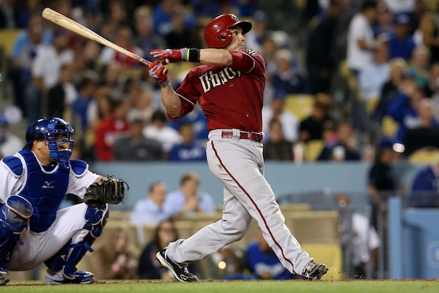 LOS ANGELES, CA - JUNE 12:  Miguel Montero #26 of the Arizona Diamondbacks hits an RBI single to tie the score in the seventh inning against the Los Angeles Dodgers at Dodger Stadium on June 12, 2013 in Los Angeles, California.  (Photo by Stephen Dunn/Getty Images)
