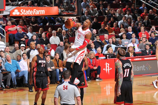 HOUSTON, TX - MARCH 4: Dwight Howard #12 of the Houston Rockets dunks against the Miami Heat at the Toyota Center March 4, 2014 in Houston, Texas. NOTE TO USER: User expressly acknowledges and agrees that, by downloading and or using this photograph, User is consenting to the terms and conditions of the Getty Images License Agreement. Mandatory Copyright Notice: Copyright 2014 NBAE (Photo by Jesse D. Garrabrant/NBAE via Getty Images) HOUSTON, TX - MARCH 4: Dwight Howard #12 of the Houston Rockets dunks against the Miami Heat at the Toyota Center March 4, 2014 in Houston, Texas. NOTE TO USER: User expressly acknowledges and agrees that, by downloading and or using this photograph, User is consenting to the terms and conditions of the Getty Images License Agreement. Mandatory Copyright Notice: Copyright 2014 NBAE (Photo by Jesse D. Garrabrant/NBAE via Getty Images)