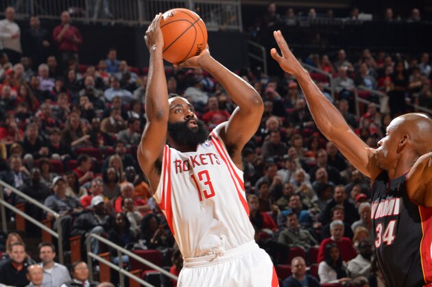 HOUSTON, TX - MARCH 4: James Harden #13 of the Houston Rockets shoots against the Miami Heat at the Toyota Center March 4, 2014 in Houston, Texas. NOTE TO USER: User expressly acknowledges and agrees that, by downloading and or using this photograph, User is consenting to the terms and conditions of the Getty Images License Agreement. Mandatory Copyright Notice: Copyright 2014 NBAE (Photo by Jesse D. Garrabrant/NBAE via Getty Images)