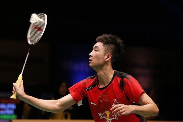 China's Wang Zhengming returns the shuttlecock to Malaysia's Lee Chong Wei during their men's single match at the Malaysia Open Badminton Super Series in Kuala Lumpur, Malaysia, Thursday Jan. 16, 2014. (AP Photo/Vincent Thian)