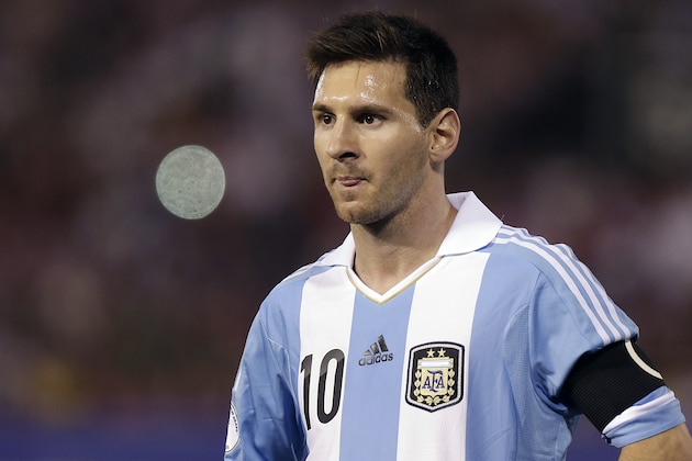 FILE - The Sept. 10, 2013 file photo shows Argentina's Lionel Messi on during a 2014 World Cup qualifying soccer game against Paraguay in Asuncion, Paraguay. Brazilian fans hoping for a home-team win at this year's World Cup are hoping just as hard that archrival Argentina does not lift the trophy.(AP Photo/Andre Penner, File)