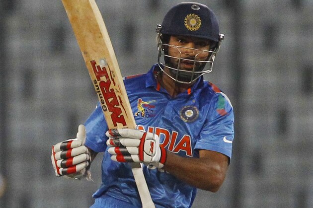India’s Shikhar Dhawan watches his shot during the match against Afghanistan of the Asia Cup one-day international cricket tournament in Dhaka, Bangladesh, Wednesday, March 5, 2014. (AP Photo/A.M. Ahad) India’s Shikhar Dhawan watches his shot during the match against Afghanistan of the Asia Cup one-day international cricket tournament in Dhaka, Bangladesh, Wednesday, March 5, 2014. (AP Photo/A.M. Ahad)