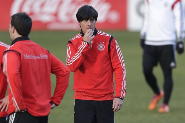 Germany's head coach Joachim Loew watches his players during a training session prior to the international friendly soccer match between Germany and Chile in Stuttgart, southern Germany, Monday, March 3, 2014. Germany will face Chile Wednesday. (AP Photo/Matthias Schrader)