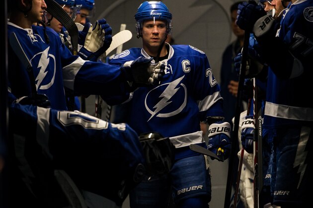TAMPA, FL - FEBRUARY 6: Martin St. Louis #26 of the Tampa Bay Lightning gets his team ready for pre game warmups prior to the game against the Toronto Maple Leafs at the Tampa Bay Times Forum on February 6, 2014 in Tampa, Florida.  (Photo by Scott Audette/NHLI via Getty Images)