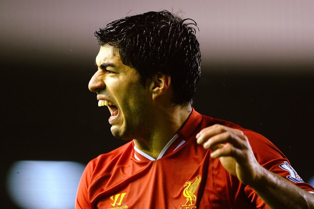 LIVERPOOL, ENGLAND - JANUARY 28:  Luis Suarez of Liverpool reacts during the Barclays Premier League match between Liverpool and Everton at Anfield on January 28, 2014 in Liverpool, England.  (Photo by Laurence Griffiths/Getty Images)